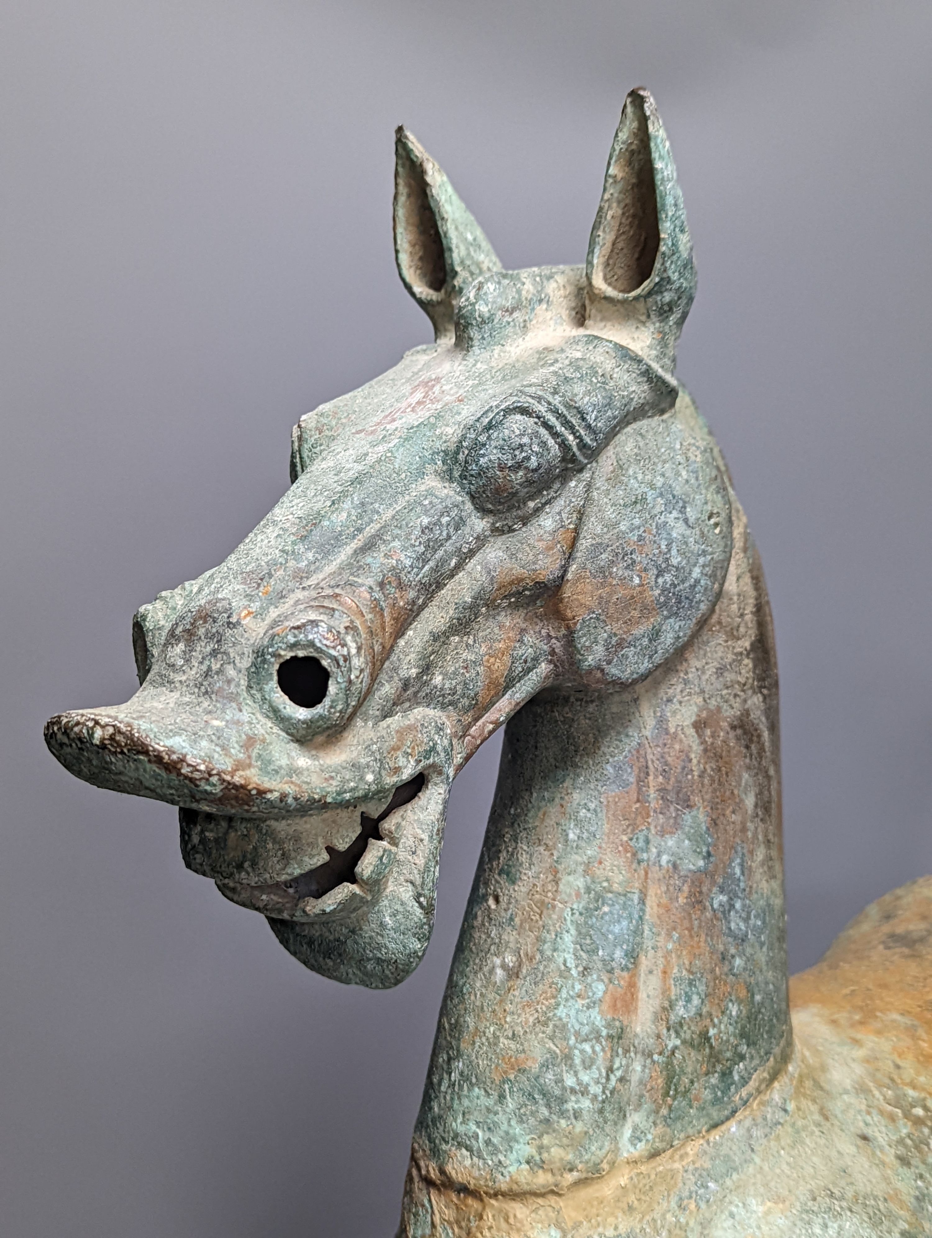 A large Chinese bronze figure of a horse, Han style 58cm